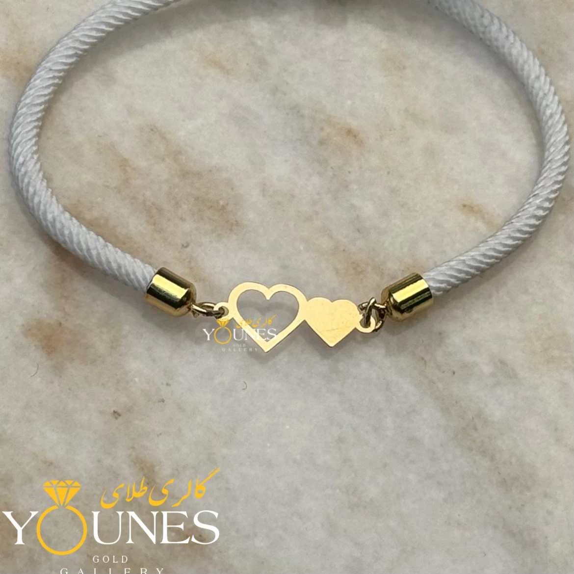 دستبند دو قلب پر و تو خالی طلا لیزری